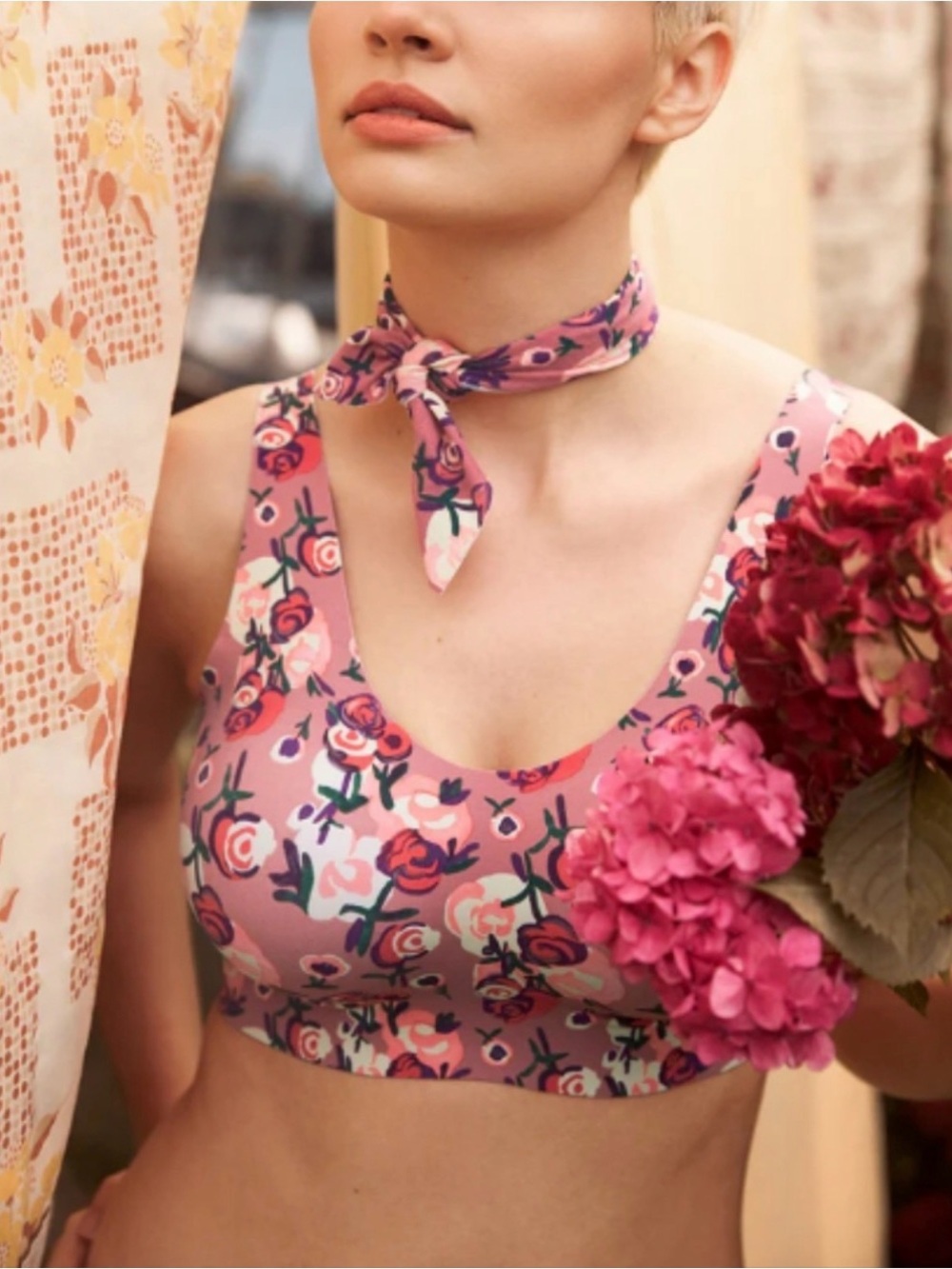 Knix x Anna Sui Rose Bouquet Luxe Lift Pullover Bra in a pink floral print. M+